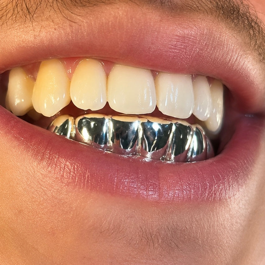 6 Silver Teeth