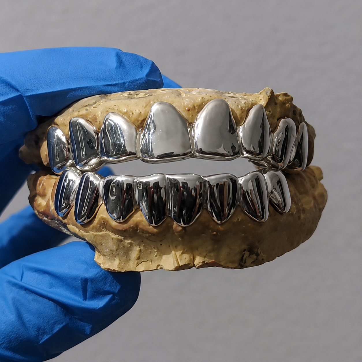 16 Silver Teeth